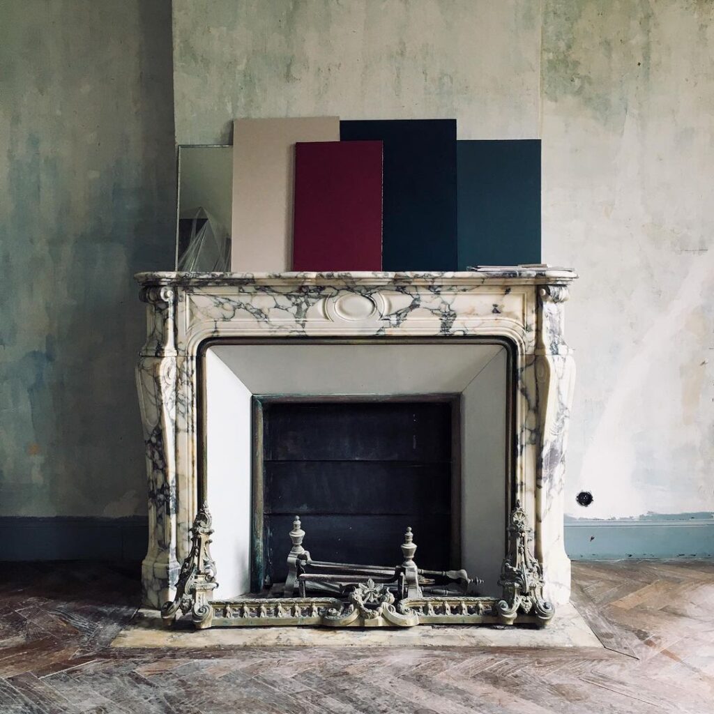 Old marble fireplace with colour tests